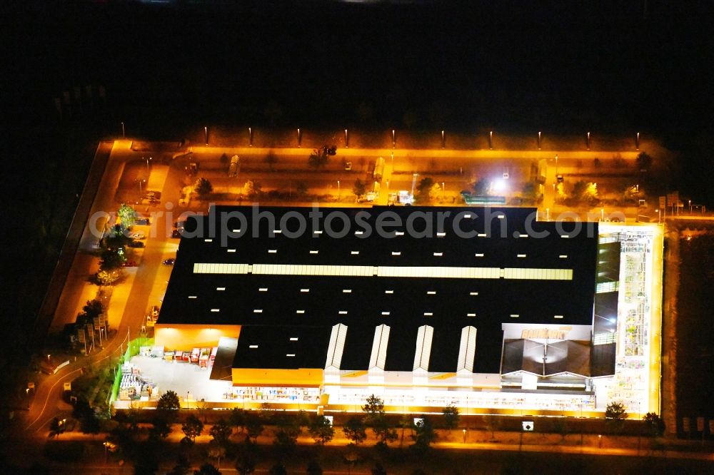 Dresden at night from above - Night lighting building of the construction market Globus Baumarkt Dresden on Raehnitzer Allee in the district Hellerau in Dresden in the state Saxony, Germany