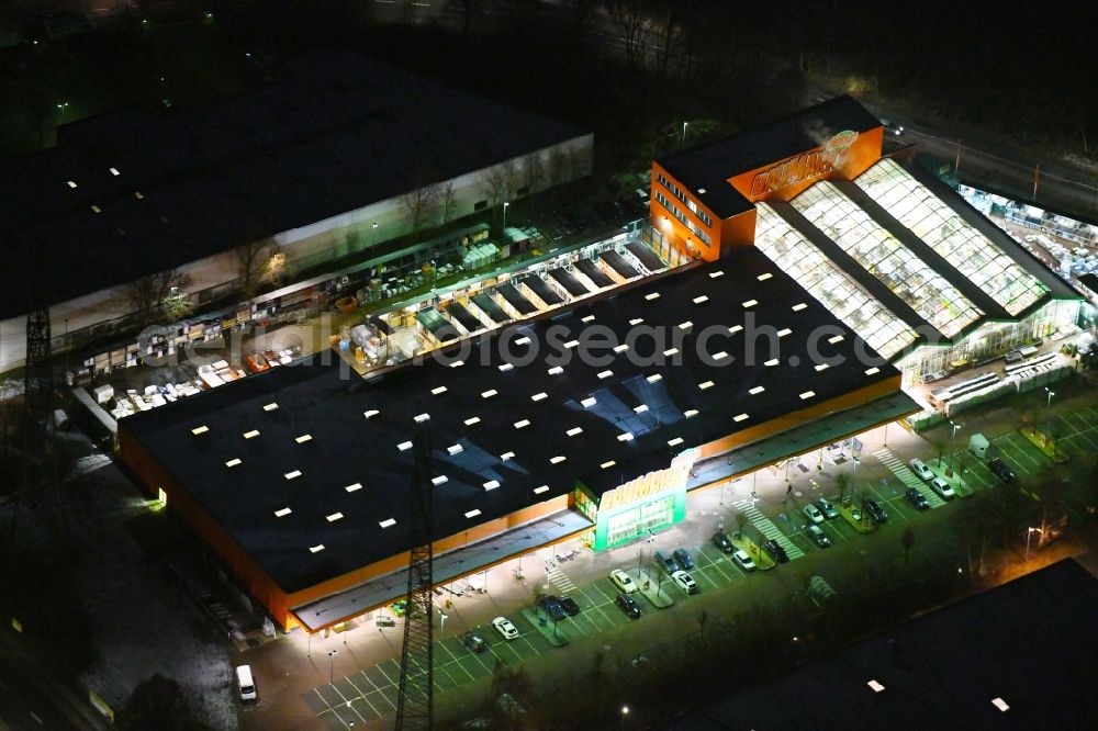 Oststeinbek at night from above - Night lighting building of the construction market Globus Baumarkt Oststeinbek Willinghusener Weg in Oststeinbek in the state Schleswig-Holstein, Germany