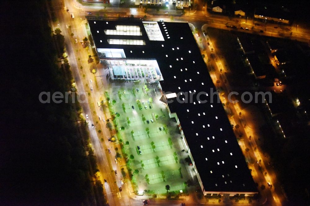 Berlin at night from above - Night view building of the construction market of Hellweg-Die Profibaumaerkte GmbH & Co. KG destrict Biesdorf in Berlin