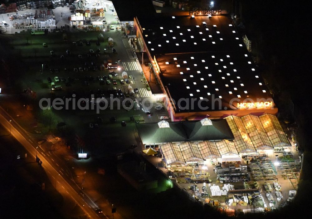 Magdeburg at night from above - Night lighting Building of the construction market of Hornbach on Silberbergweg in the district Grosser Silberberg in Magdeburg in the state Saxony-Anhalt