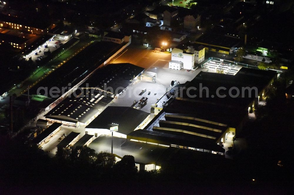 Berlin at night from above - Night view building of the construction market of Possling GmbH & Co.KG Britz an der Haarlemer Strasse in Berlin