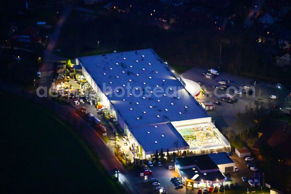 Bernau at night from above - Night lighting building of the construction market toom Baumarkt in Bernau in the state Brandenburg, Germany