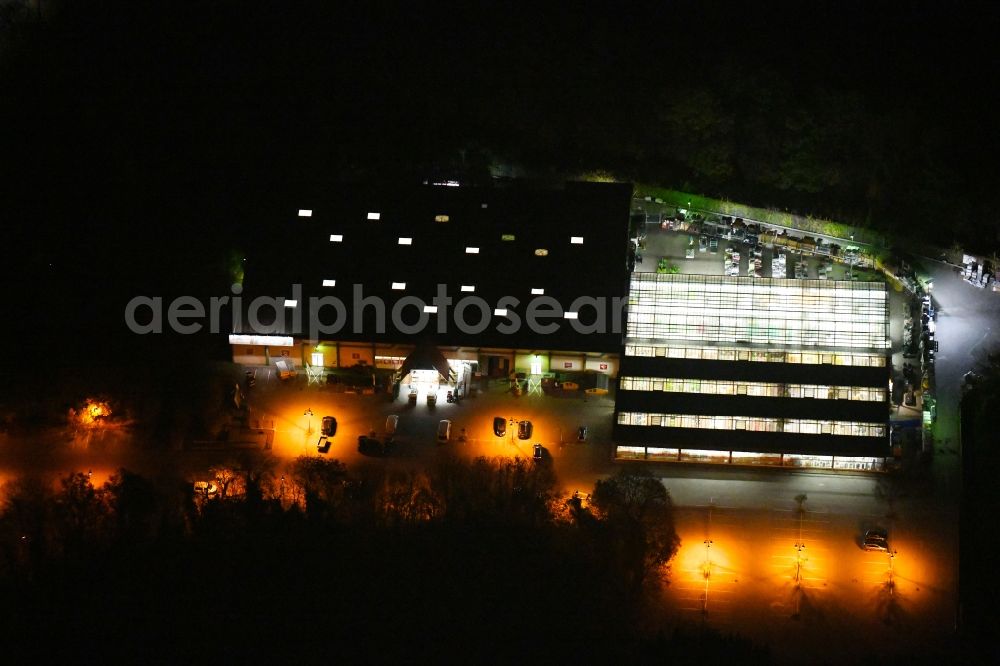 Aerial image at night Eberswalde - Night lighting Building of the construction market toom Baumarkt in Eberswalde in the state Brandenburg, Germany