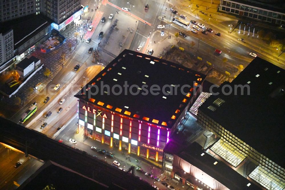 Berlin at night from above - Night lighting Building of the shopping center Alexa on Grunerstrasse in Berlin, Germany