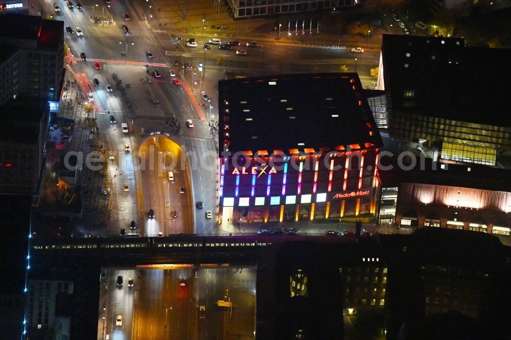 Berlin at night from above - Night lighting Building of the shopping center Alexa on Grunerstrasse in Berlin, Germany