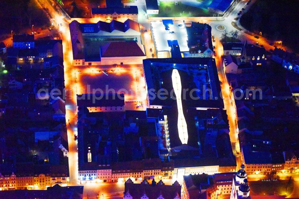 Lutherstadt Wittenberg at night from above - Night lighting Building of the shopping center ARSENAL in Lutherstadt Wittenberg in the state Saxony-Anhalt