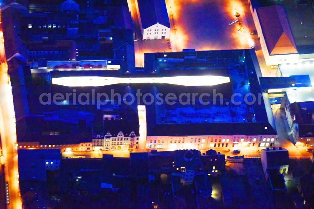 Lutherstadt Wittenberg at night from above - Night lighting Building of the shopping center ARSENAL in Lutherstadt Wittenberg in the state Saxony-Anhalt