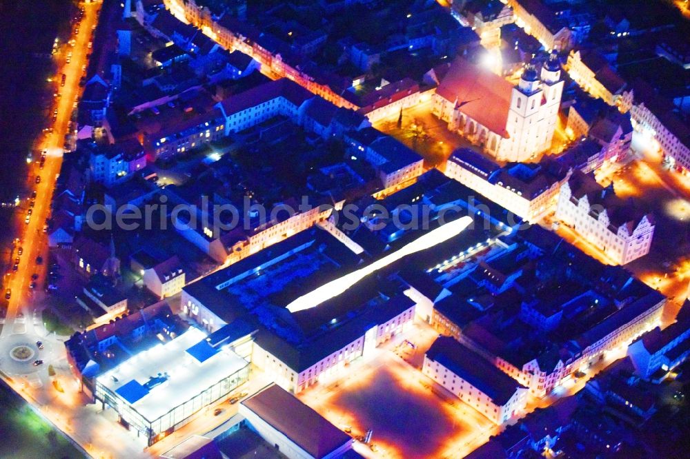 Lutherstadt Wittenberg at night from above - Night lighting Building of the shopping center ARSENAL in Lutherstadt Wittenberg in the state Saxony-Anhalt