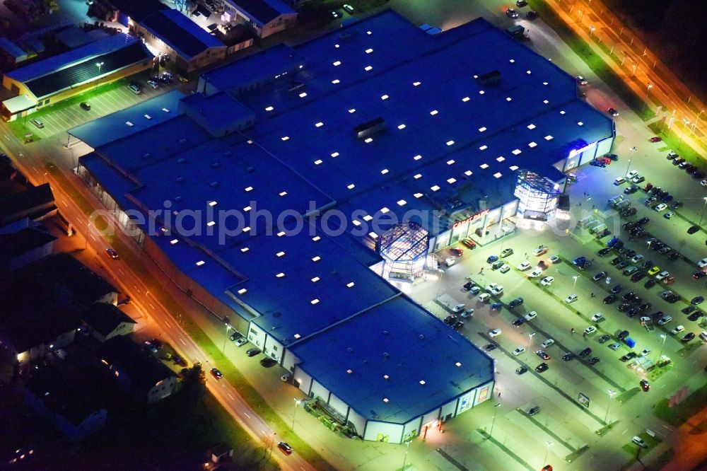 Lutherstadt Wittenberg at night from above - Night lighting Building of the shopping center Carat-Park in Lutherstadt Wittenberg in the state Saxony-Anhalt