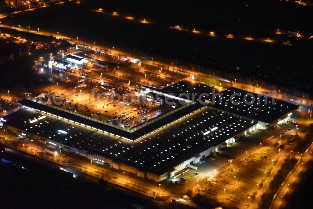 Magdeburg at night from above - Night lighting Building of the shopping center Florapark on Olvenstedter Graseweg in Magdeburg in the state Saxony-Anhalt