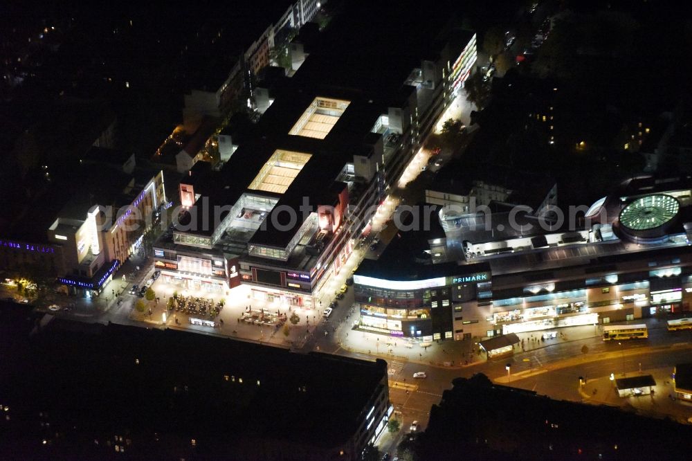 Berlin at night from above - Night view Building of the shopping center Forum Steglitz on Schlossallee in Berlin