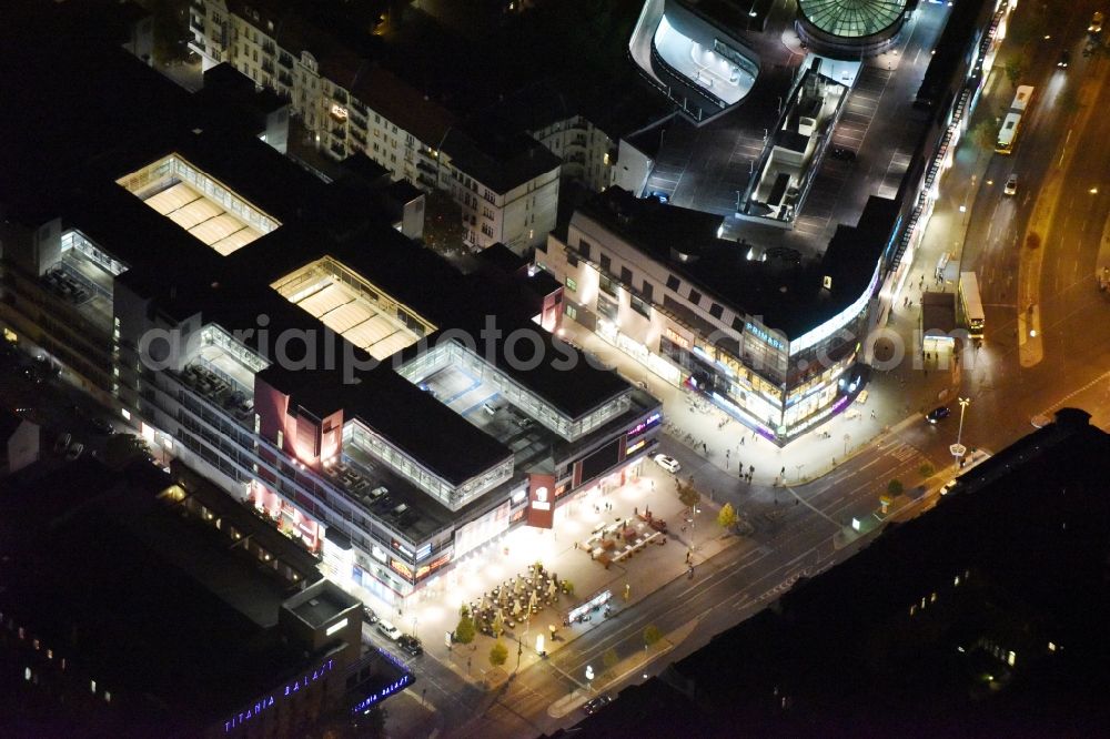 Berlin at night from above - Night view Building of the shopping center Forum Steglitz on Schlossallee in Berlin