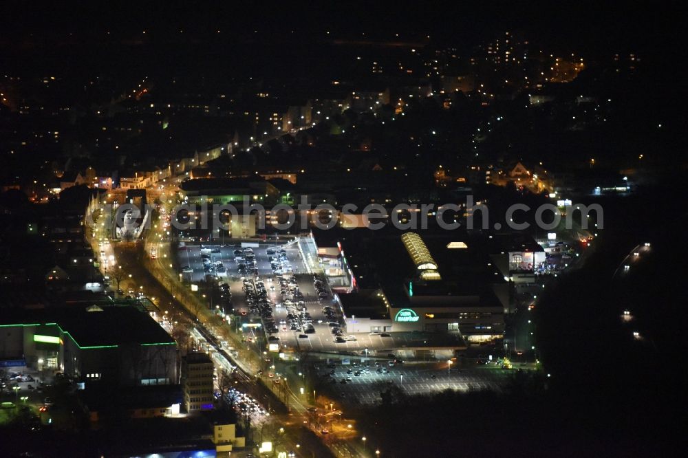 Aerial image at night Frankfurt am Main - Night view Building of the shopping center Hessen-Center of ECE Projektmanagement GmbH & Co. KG an der Borsigallee in Frankfurt in the state Hesse