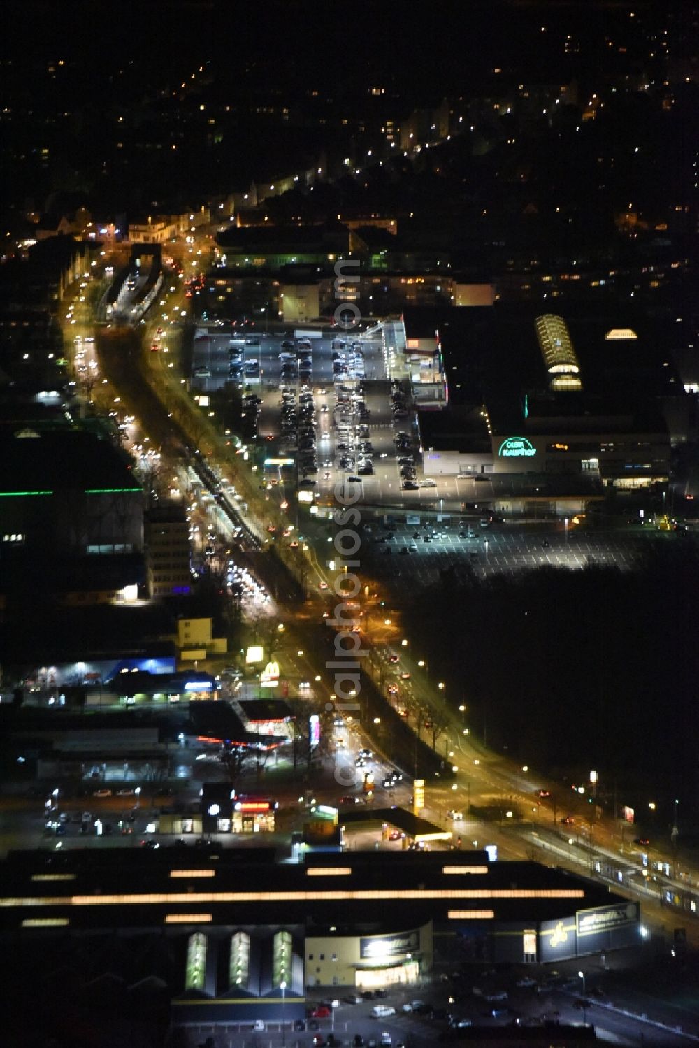 Frankfurt am Main at night from above - Night view Building of the shopping center Hessen-Center of ECE Projektmanagement GmbH & Co. KG an der Borsigallee in Frankfurt in the state Hesse