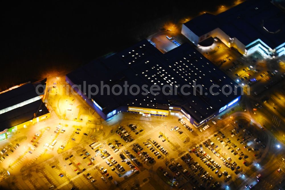 Aerial image at night Braunschweig - Night lighting Building of the store - furniture market IKEA Deutschland GmbH & Co. KG in Braunschweig in the state Lower Saxony