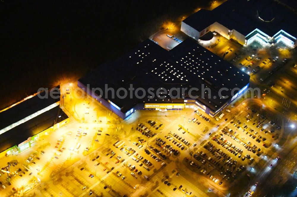 Aerial image at night Braunschweig - Night lighting Building of the store - furniture market IKEA Deutschland GmbH & Co. KG in Braunschweig in the state Lower Saxony