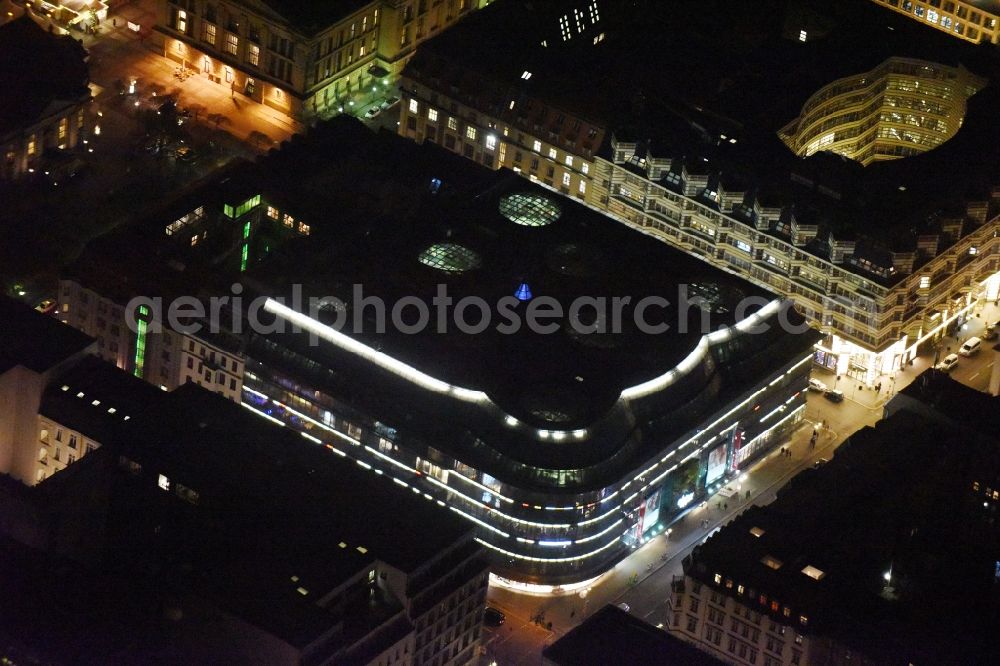 Aerial image at night Berlin - Night view building of the shopping center Kaufhaus Galeries Lafayette in Berlin