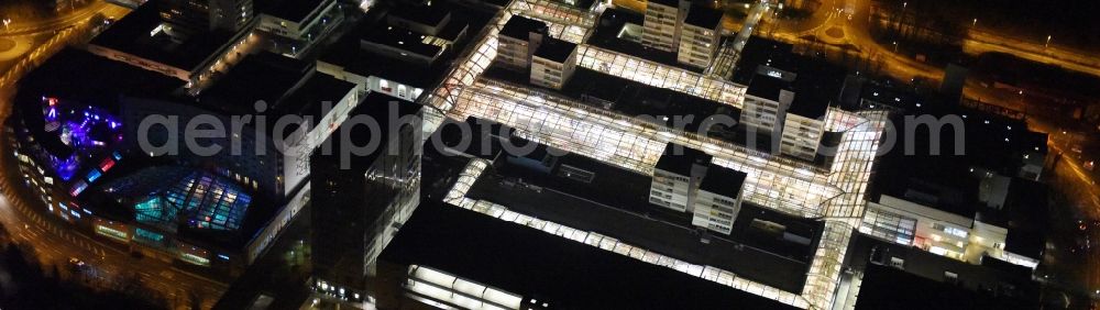 Aerial photograph at night Frankfurt am Main - Night view Building the shopping center Nordwest Zentrum in Frankfurt in the state Hesse