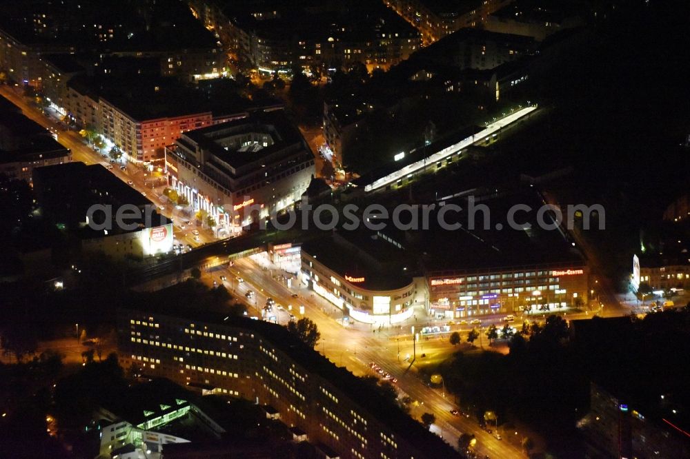 Berlin at night from above - Night view building of the shopping center Ring-Center der ECE Gruppe an der Frankfurter Allee im Stadtbezirk Friedrichshain in Berlin