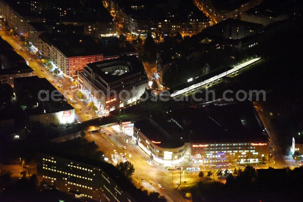 Berlin at night from above - Night view building of the shopping center Ring-Center der ECE Gruppe an der Frankfurter Allee im Stadtbezirk Friedrichshain in Berlin