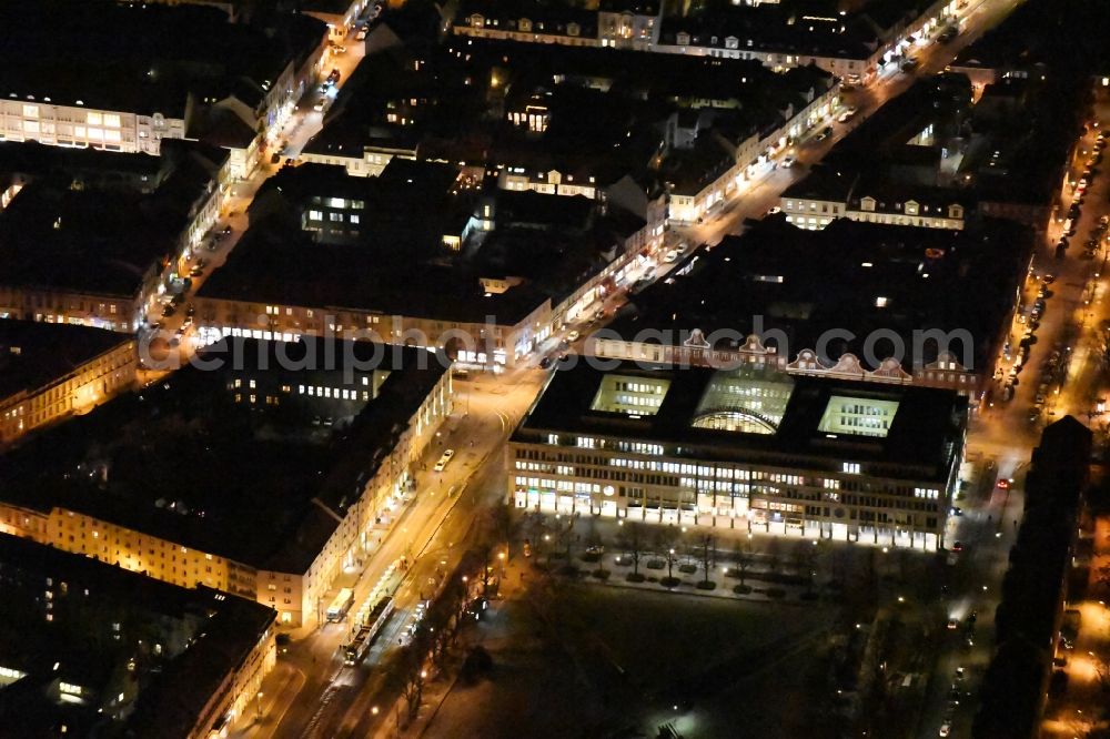 Aerial image at night Potsdam - Night view building of the shopping center WilhelmGalerie am Platz der Einheit - Charlottenstrasse in the district Innenstadt in Potsdam in the state Brandenburg