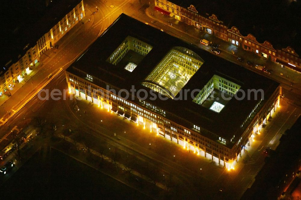 Aerial image at night Potsdam - Night view building of the shopping center WilhelmGalerie am Platz der Einheit - Charlottenstrasse in the district Innenstadt in Potsdam in the state Brandenburg