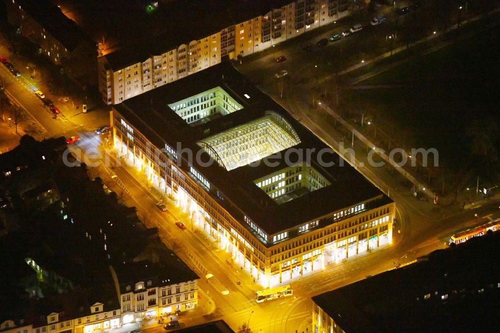 Aerial image at night Potsdam - Night view building of the shopping center WilhelmGalerie am Platz der Einheit - Charlottenstrasse in the district Innenstadt in Potsdam in the state Brandenburg