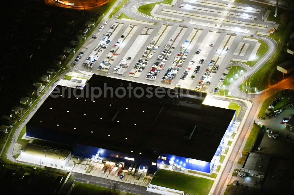 Aerial image at night Magdeburg - Night lighting building of the store - furniture market IKEA Magdeburg on Ebendorfer Chaussee in the district Kannenstieg in Magdeburg in the state Saxony-Anhalt, Germany