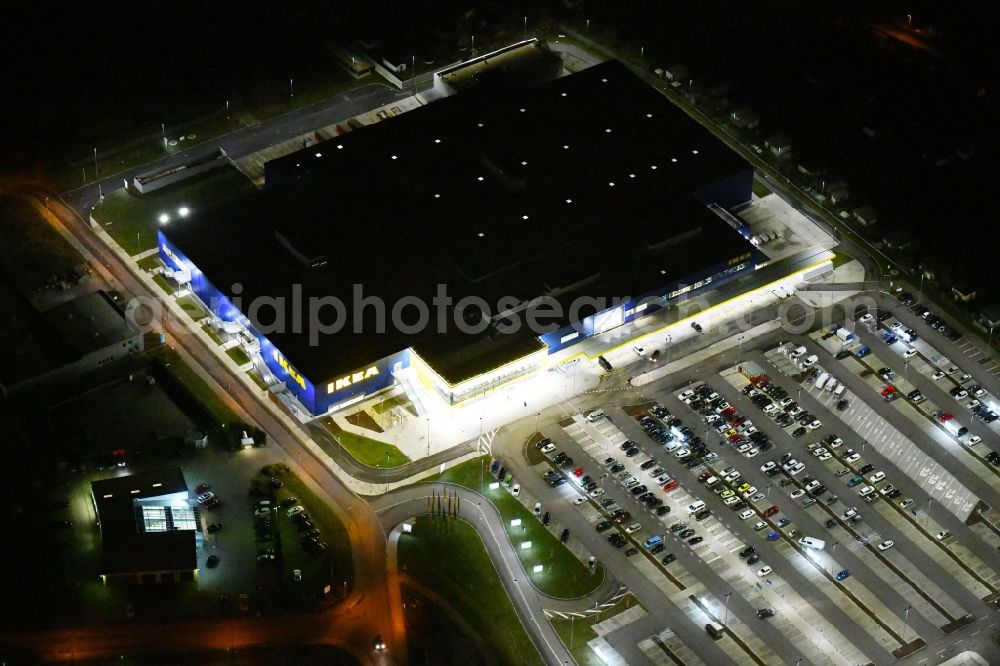 Aerial photograph at night Magdeburg - Night lighting building of the store - furniture market IKEA Magdeburg on Ebendorfer Chaussee in the district Kannenstieg in Magdeburg in the state Saxony-Anhalt, Germany