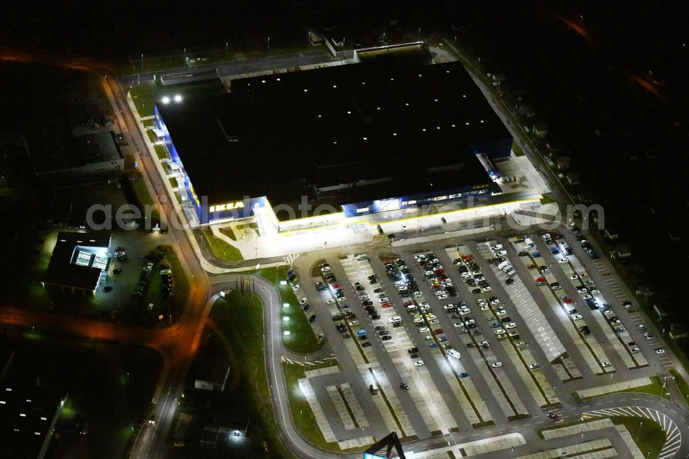 Aerial image at night Magdeburg - Night lighting building of the store - furniture market IKEA Magdeburg on Ebendorfer Chaussee in the district Kannenstieg in Magdeburg in the state Saxony-Anhalt, Germany