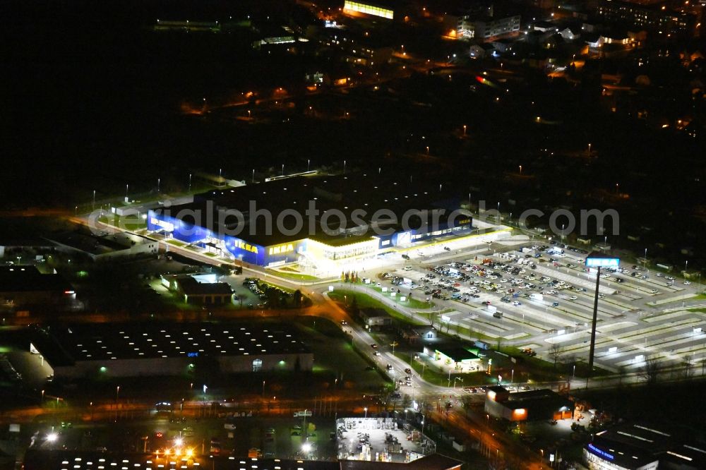 Aerial image at night Magdeburg - Night lighting building of the store - furniture market IKEA Magdeburg on Ebendorfer Chaussee in the district Kannenstieg in Magdeburg in the state Saxony-Anhalt, Germany