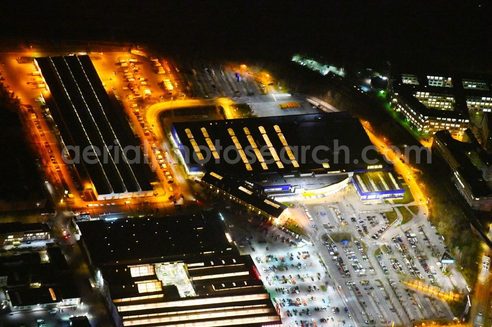 Berlin at night from above - Night lighting Building of the store - furniture market IKEA Moebel & Einrichtungshaus Berlin-Tempelhof on Sachsendonm in the district Tempelhof-Schoeneberg in Berlin, Germany