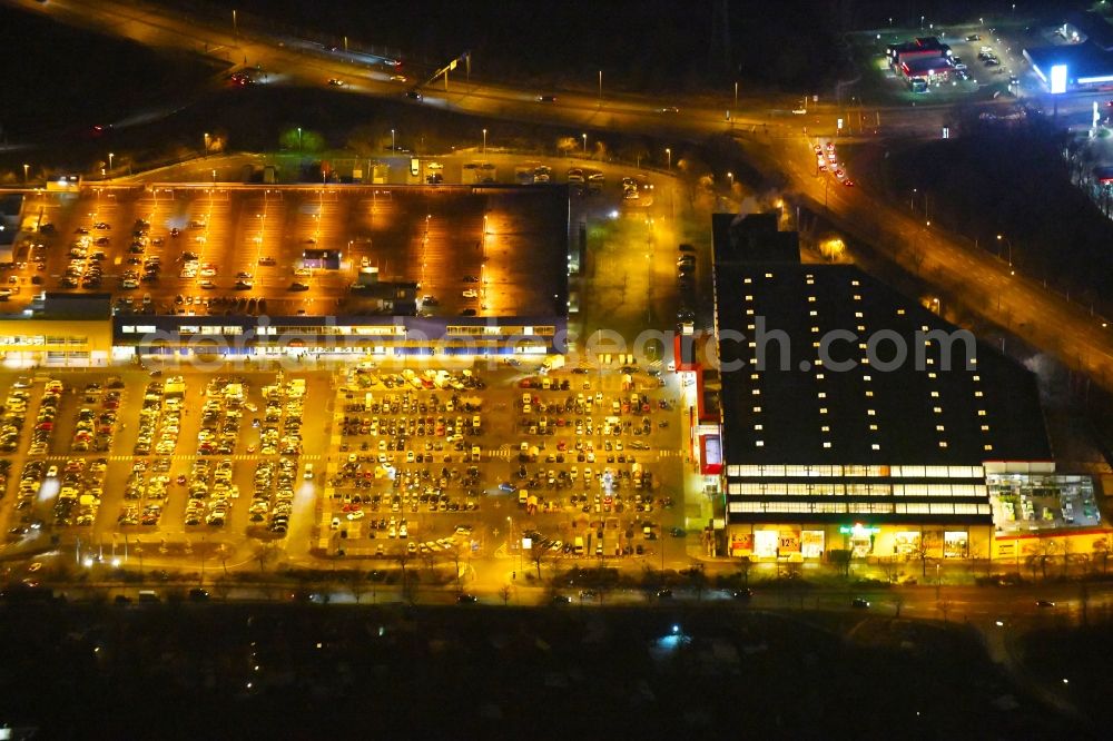 Hamburg at night from the bird perspective: Night lighting building of the store - furniture market IKEA Moebel & Einrichtungshaus Hamburg-Moorfleet in the district Moorfleet in Hamburg, Germany