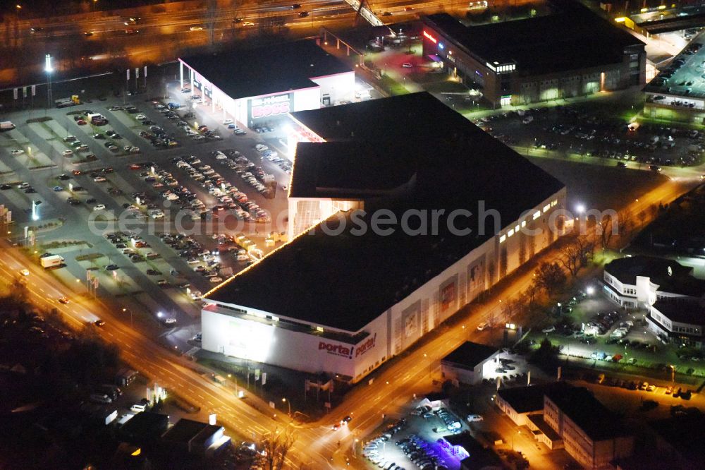 Potsdam at night from above - Night lighting Night view Building of the store - furniture market Porta Moebel in Potsdam in the state Brandenburg