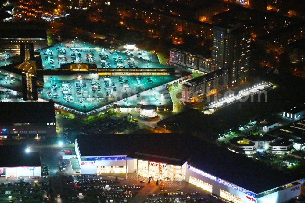 Potsdam at night from the bird perspective: Night view Building of the store - furniture market Porta Moebel in Potsdam in the state Brandenburg