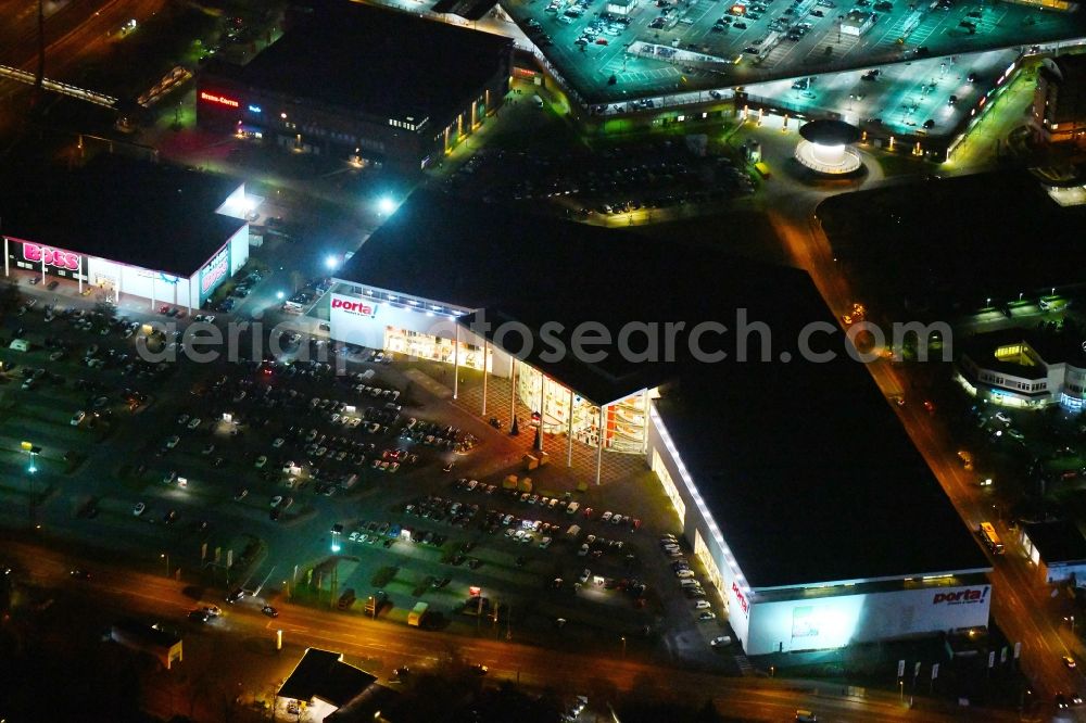 Aerial photograph at night Potsdam - Night view Building of the store - furniture market Porta Moebel in Potsdam in the state Brandenburg