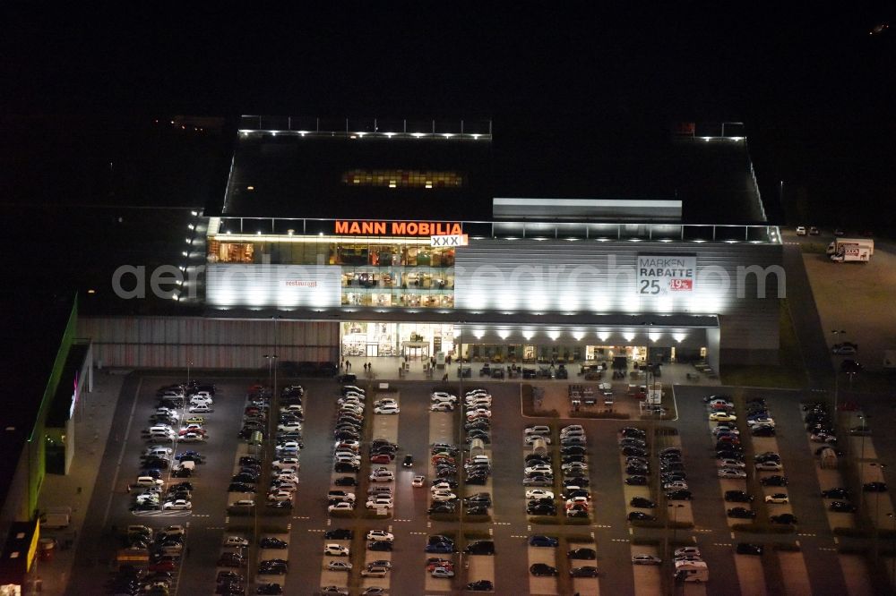 Aerial image at night Eschborn - Night view Building of the store - furniture market XXXL Mann Mobilia in Sulzbach (Taunus) in the state Hesse