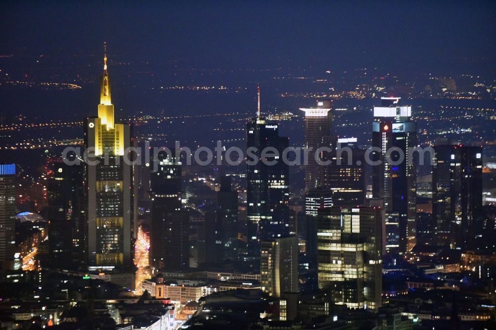 Frankfurt am Main at night from the bird perspective: Night view of the Palais Quartier on Skyline in Frankfurt am Main in Hesse. It is a building complex, which includes next to the shopping center MyZeil and the Jumeirah Frankfurt hotel also the office tower Nextower, which is desingned of KSP Engel and Zimmermann