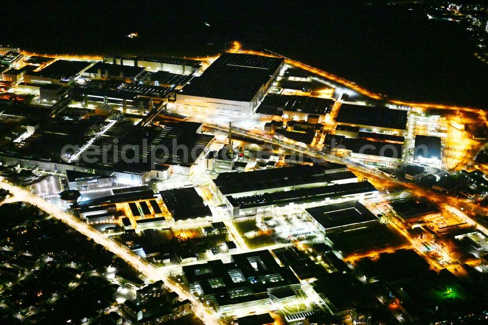 Ingolstadt at night from the bird perspective: Night lighting building and production halls on the premises of Audi in Ingolstadt in the state Bavaria