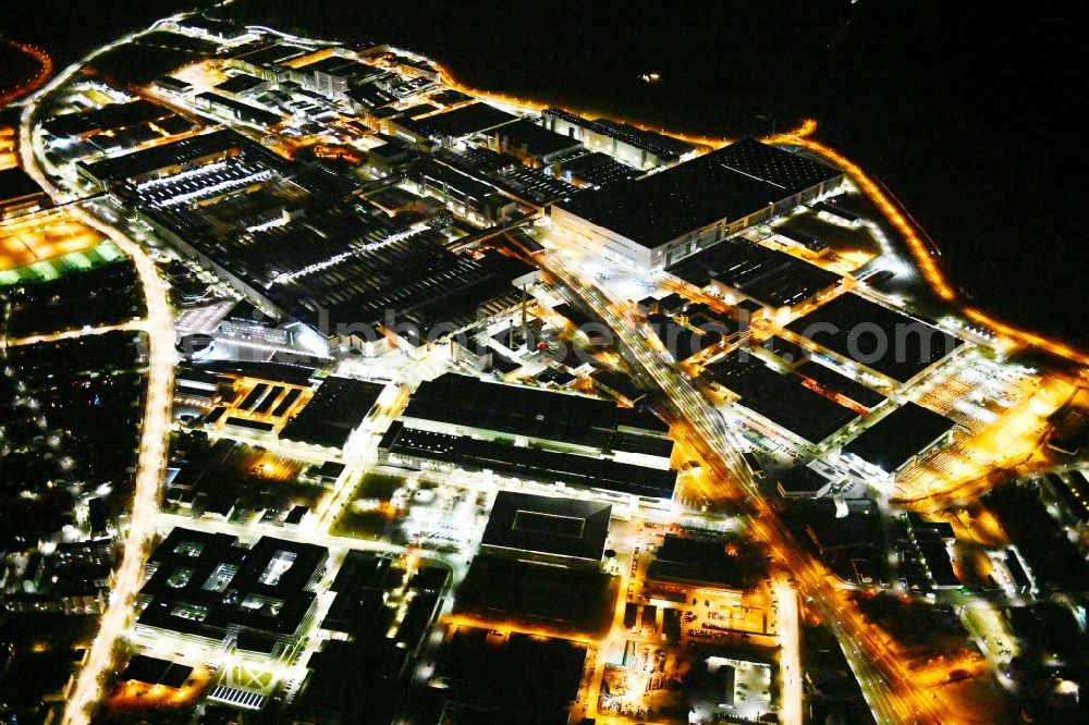 Aerial image at night Ingolstadt - Night lighting building and production halls on the premises of Audi in Ingolstadt in the state Bavaria