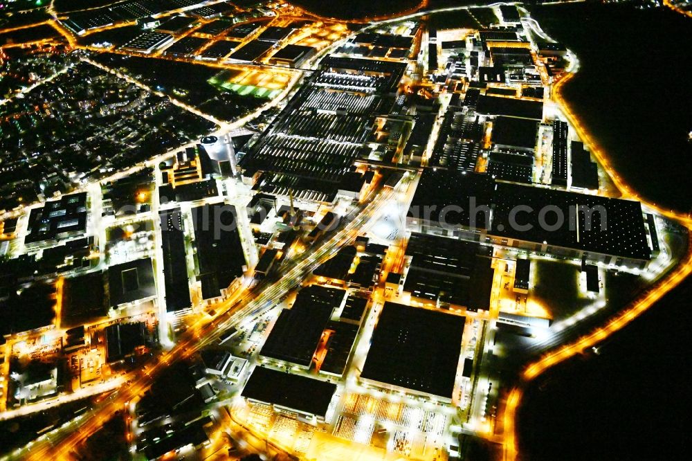 Ingolstadt at night from the bird perspective: Night lighting building and production halls on the premises of Audi in Ingolstadt in the state Bavaria