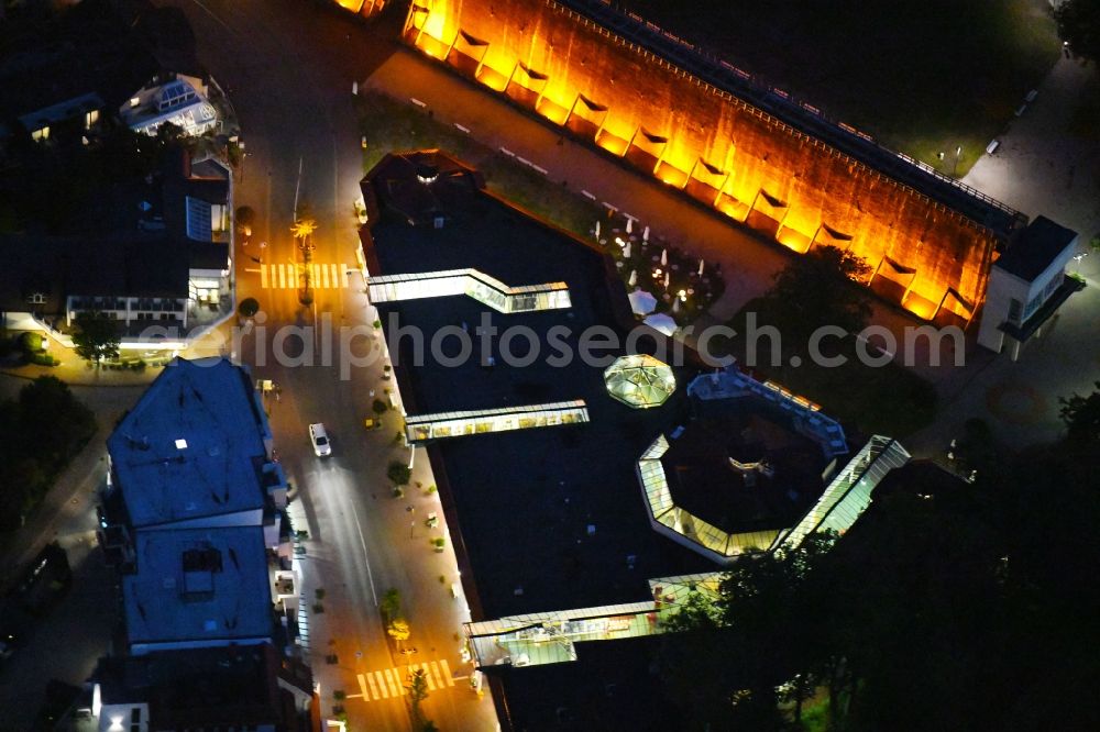 Bad Rothenfelde at night from the bird perspective: Night lighting Building of the restaurant Am alten Gradierwerk on Salinenstrasse in Bad Rothenfelde in the state Lower Saxony, Germany