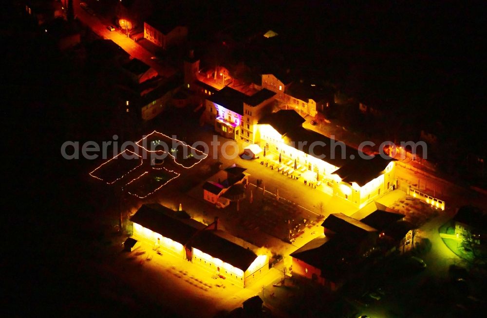 Aerial photograph at night Potsdam - Night lighting building of the restaurant Krongut Bornstedt in the district Bornstedt in Potsdam in the state Brandenburg, Germany