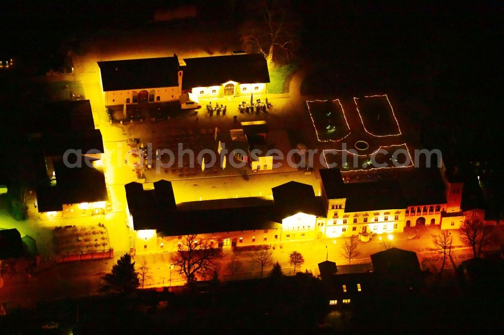 Potsdam at night from above - Night lighting building of the restaurant Krongut Bornstedt in the district Bornstedt in Potsdam in the state Brandenburg, Germany