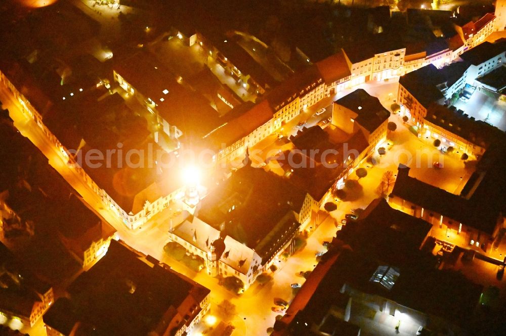 Aerial image at night Aschersleben - Night lighting town Hall building of the city administration in Aschersleben in the state Saxony-Anhalt, Germany