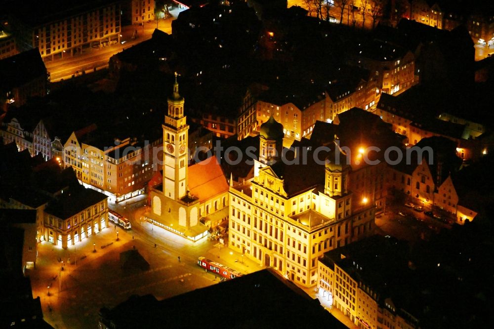 Augsburg at night from the bird perspective: Night lighting town Hall building of the city administration on Rathausplatz and tower Perlachturm and church St. Peter on Perlach in the district Altstadt in Augsburg in the state Bavaria, Germany