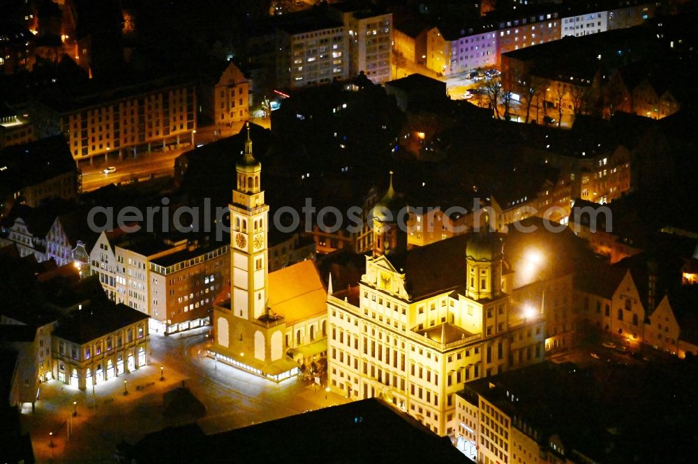 Augsburg at night from the bird perspective: Night lighting town Hall building of the city administration on Rathausplatz and tower Perlachturm and church St. Peter on Perlach in the district Altstadt in Augsburg in the state Bavaria, Germany