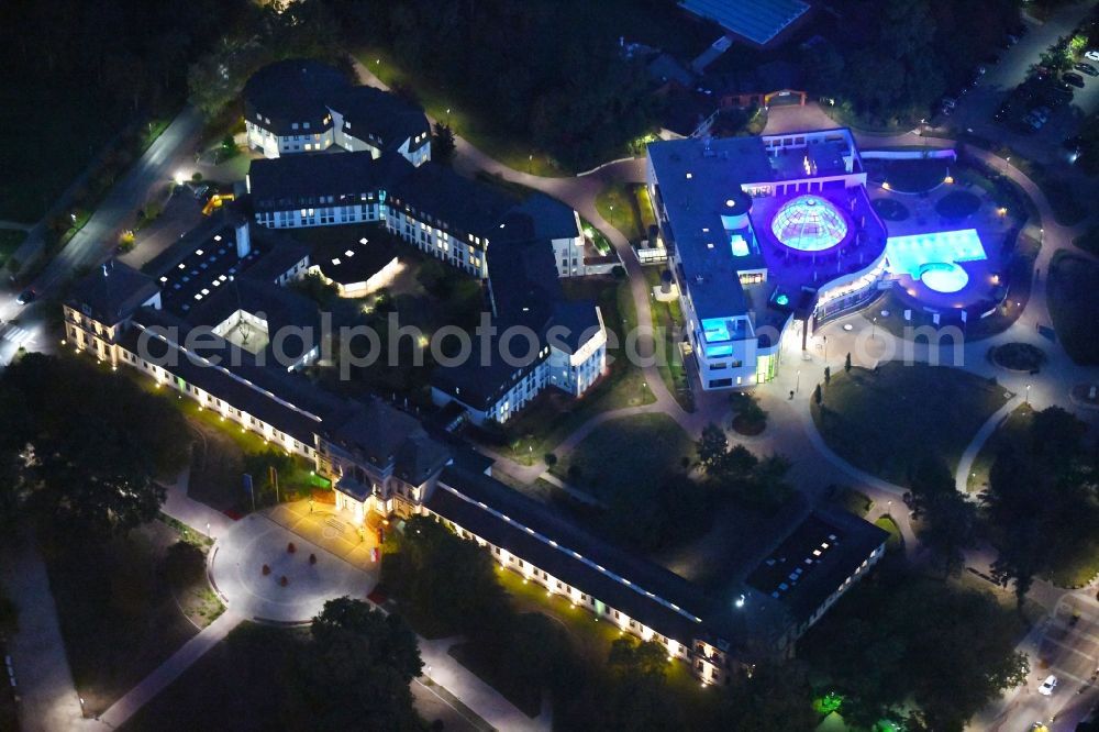 Bad Rothenfelde at night from above - Night lighting Town Hall building of the city administration - Kurverwaltung in Bad Rothenfelde in the state Lower Saxony, Germany