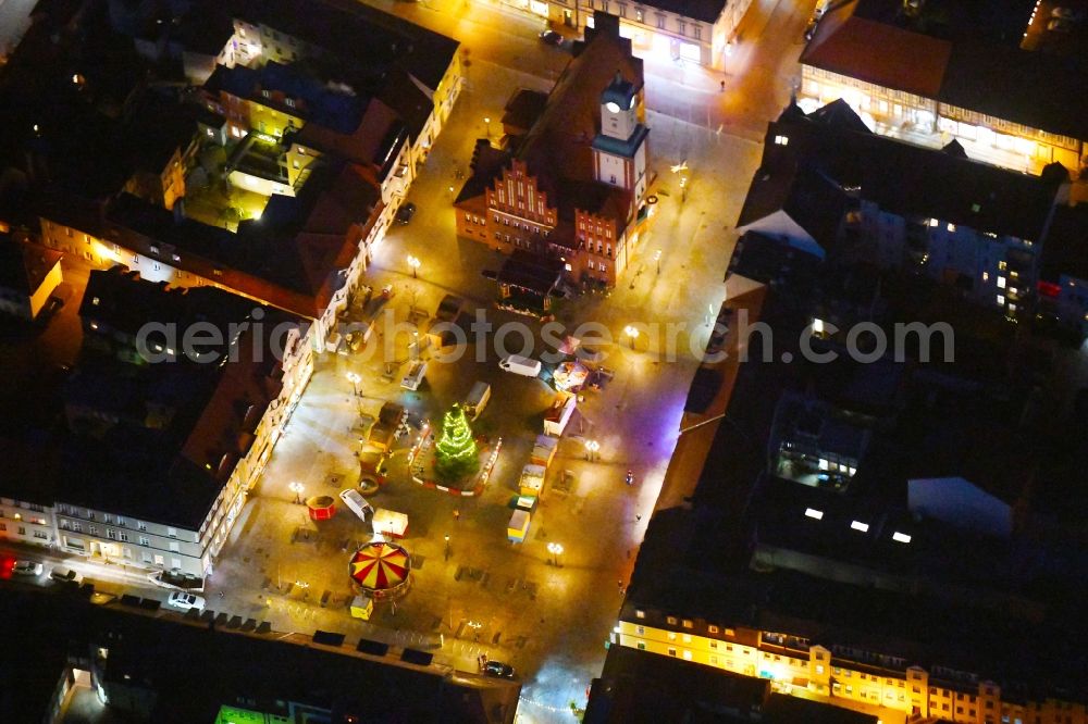 Aerial photograph at night Wittstock/Dosse - Night lighting Town Hall building of the City Council at the market downtown in Wittstock/Dosse in the state Brandenburg, Germany