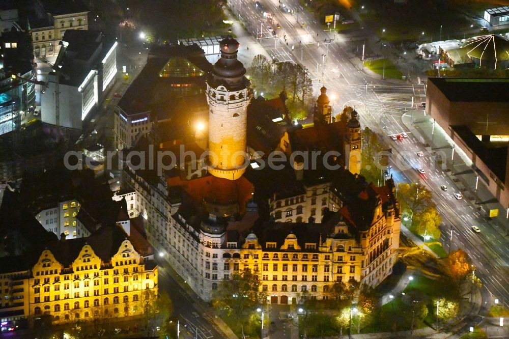 Aerial image at night Leipzig - Night lighting Town Hall building of the city administration on Martin-Luther-Ring in Leipzig in the state Saxony